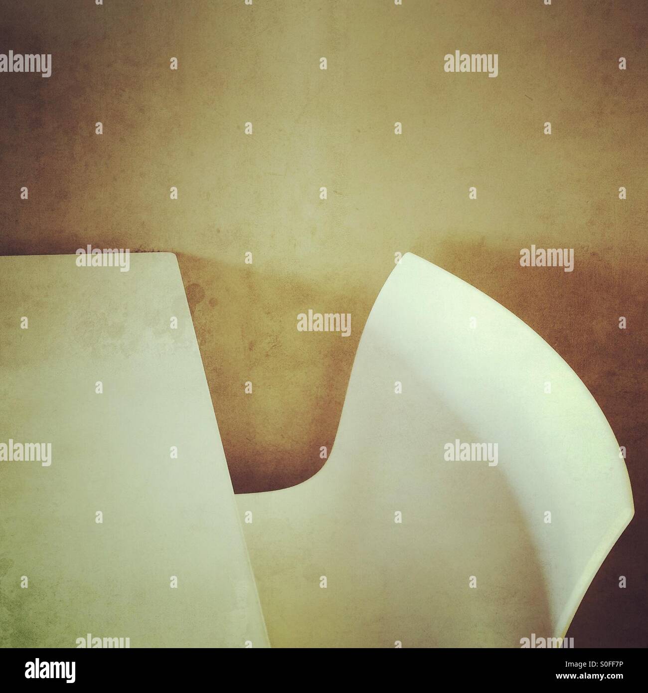 A white chair and table - Smartphone Captured Stock Image