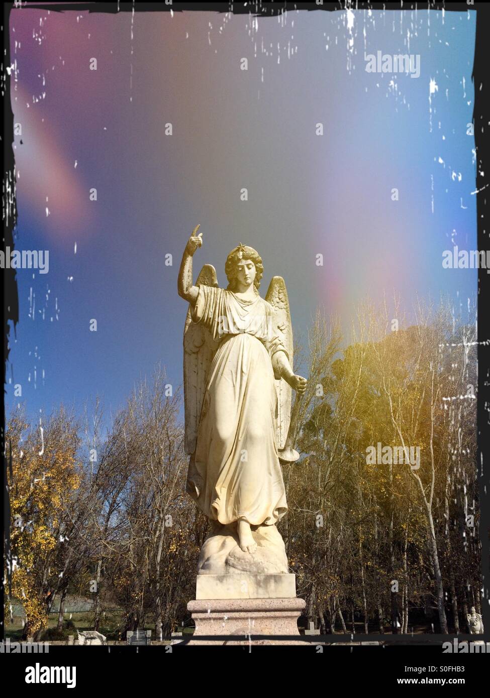 Marble angel in graveyard . - Smartphone Captured Stock Image