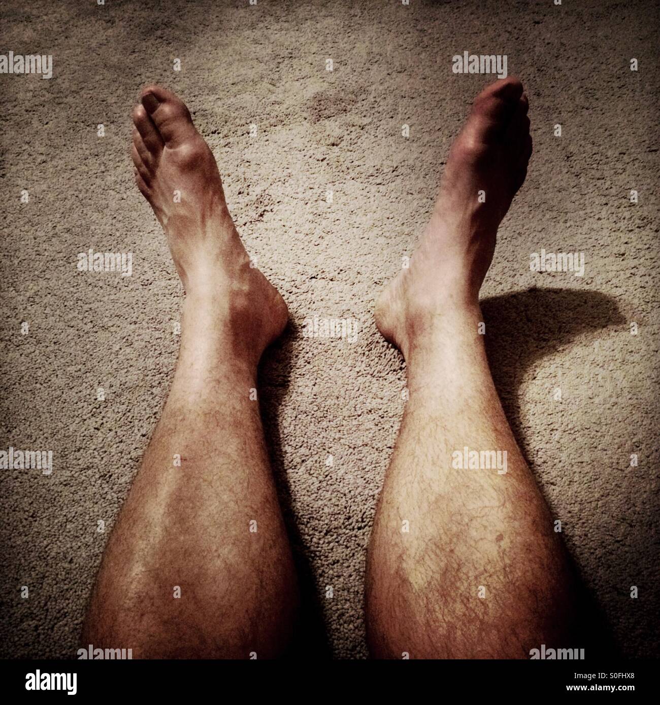 Hairy legs man hi-res stock photography and images - Alamy