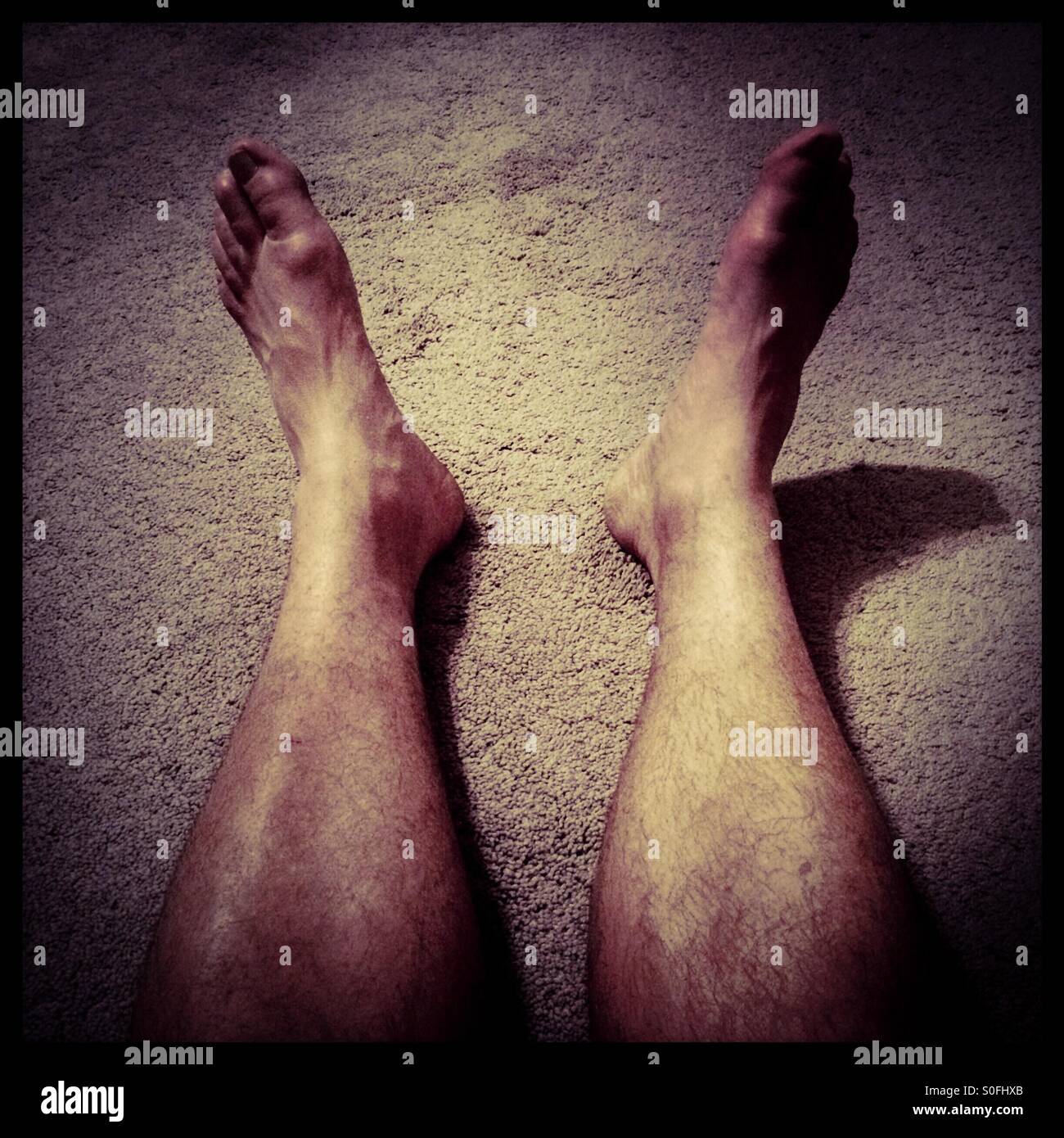 Hairy legs man hi-res stock photography and images - Alamy