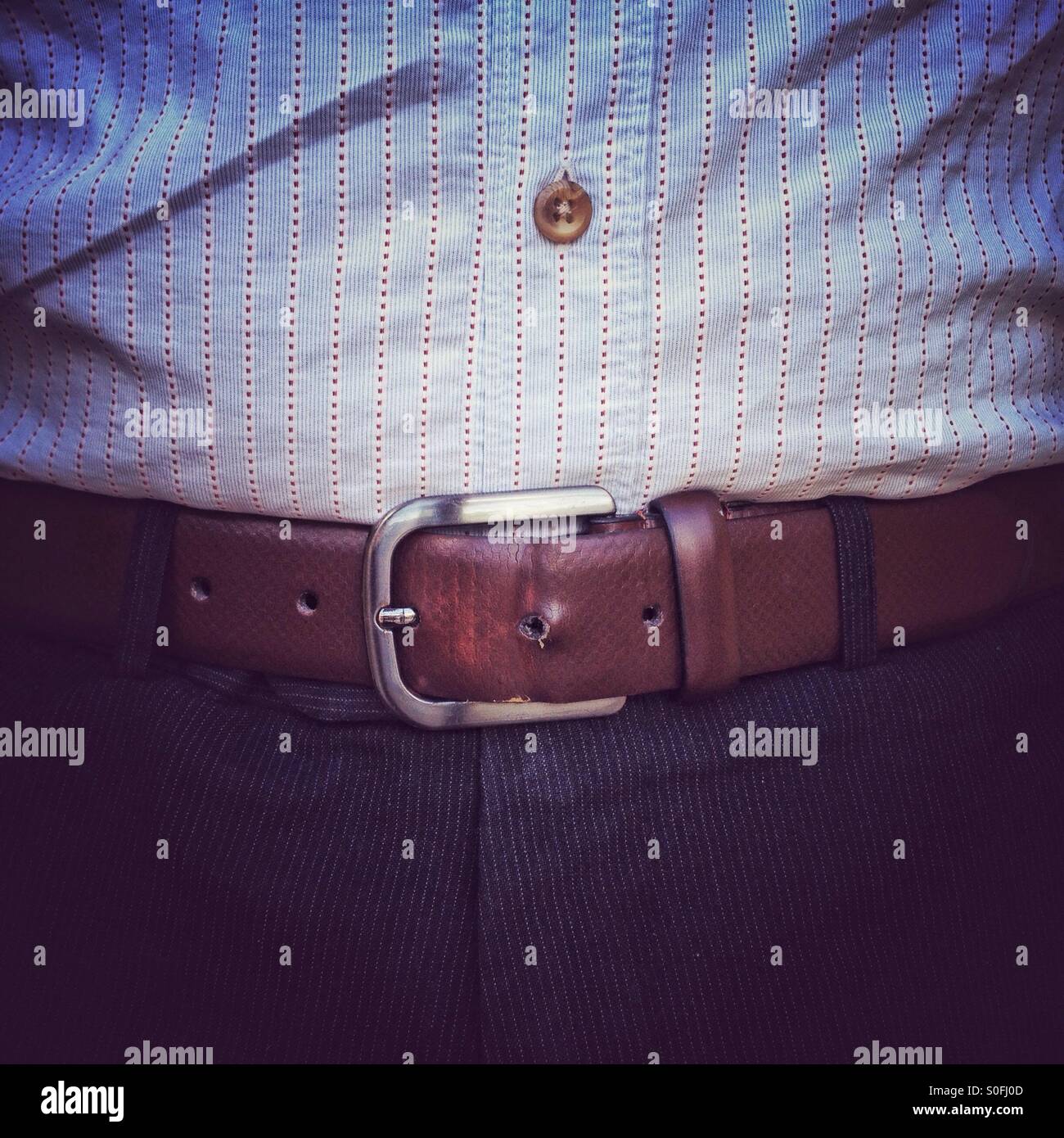 Tightened belt - Smartphone Captured Stock Image