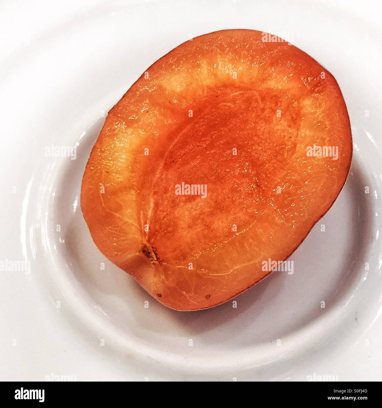 Half fresh apricot in hdr - Smartphone Captured Stock Image