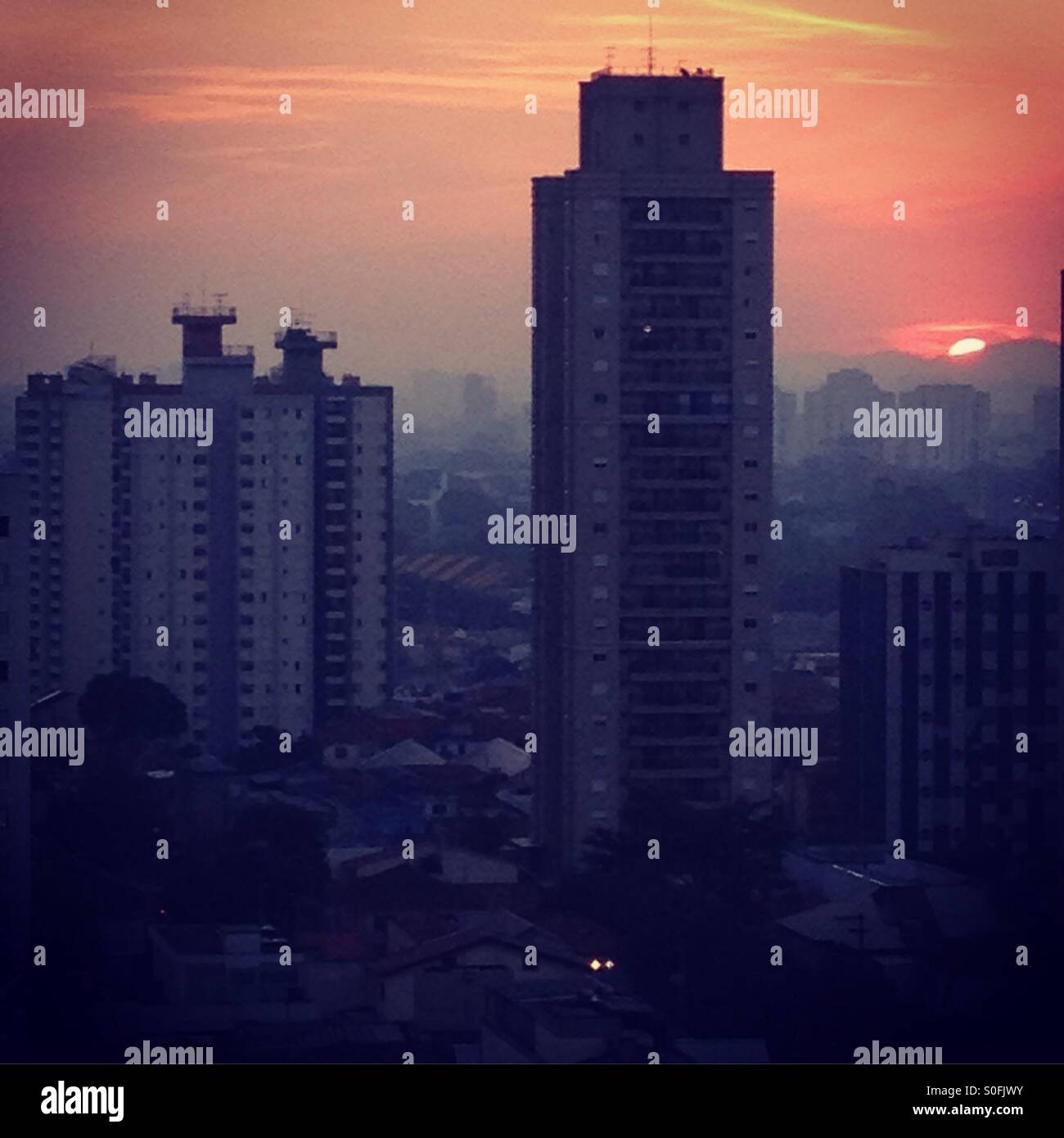Sunset at city Stock Photo