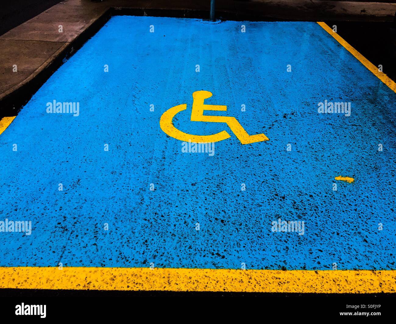 Parking space in rain - Smartphone Captured Stock Image