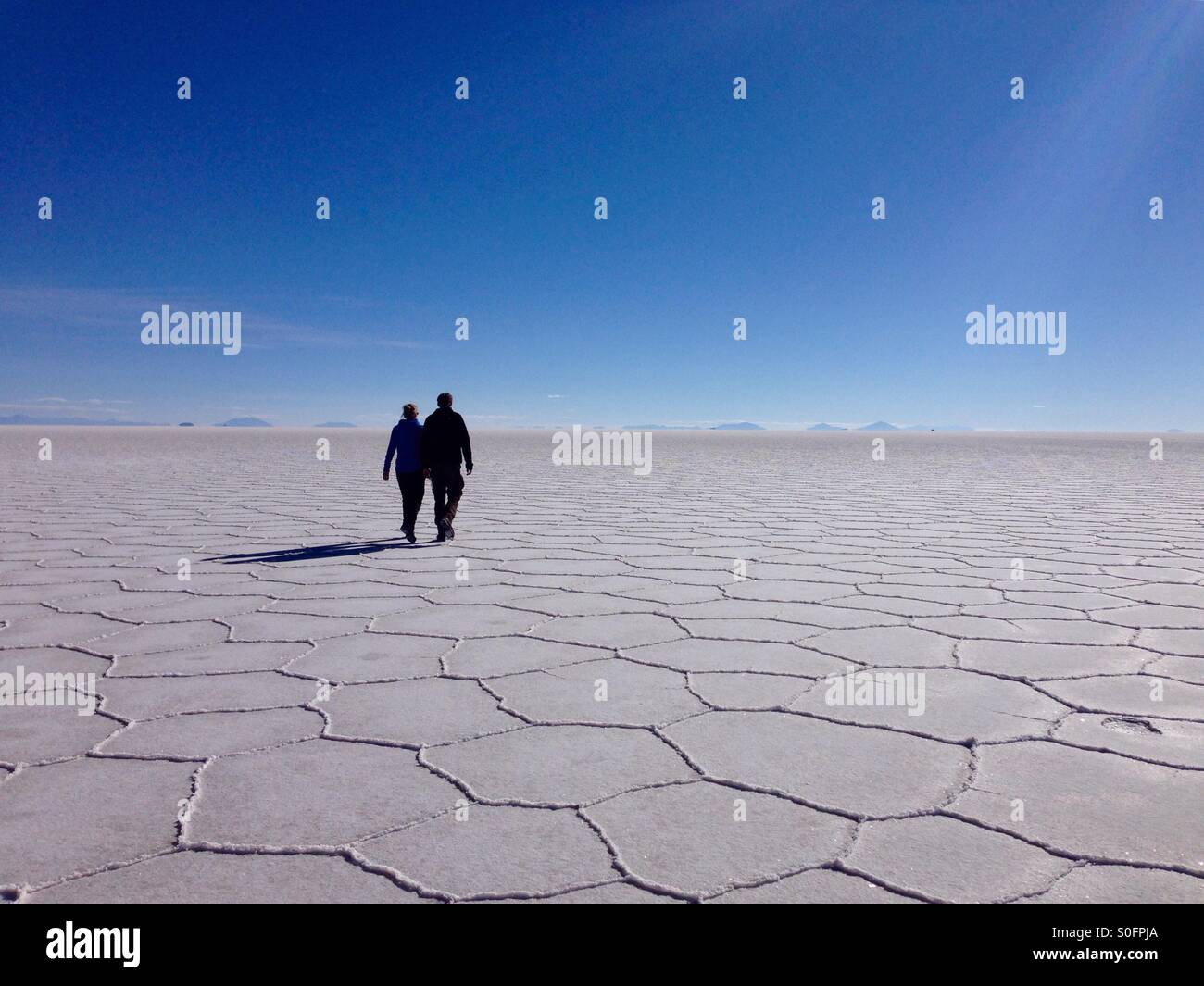 Lovely couple in desert - Smartphone Captured Stock Image