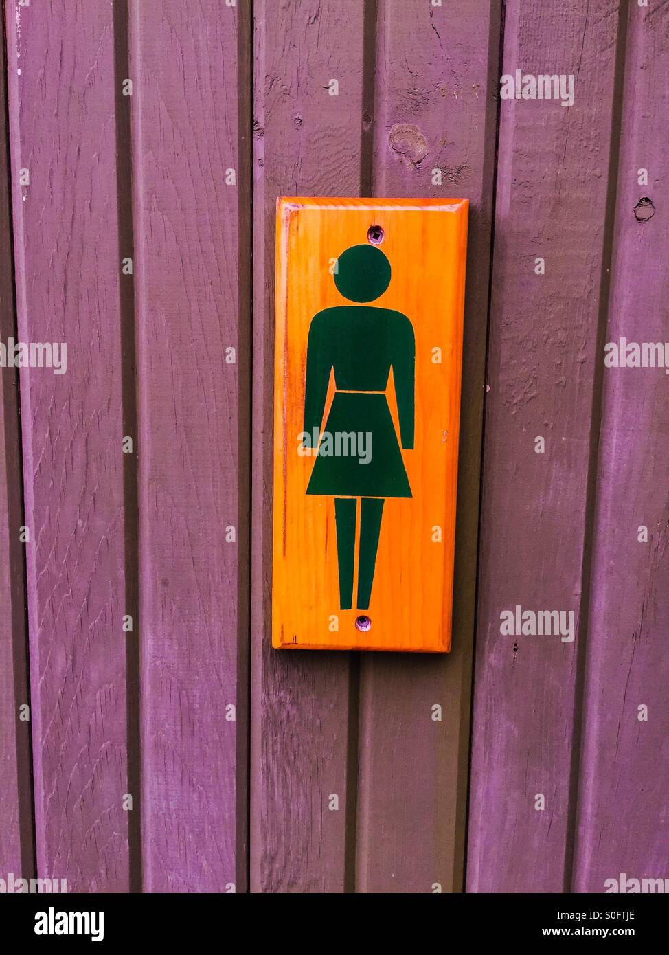 A simple, old style, hand painted sign outside a women’s washroom, Canada. - Smartphone Captured Stock Image