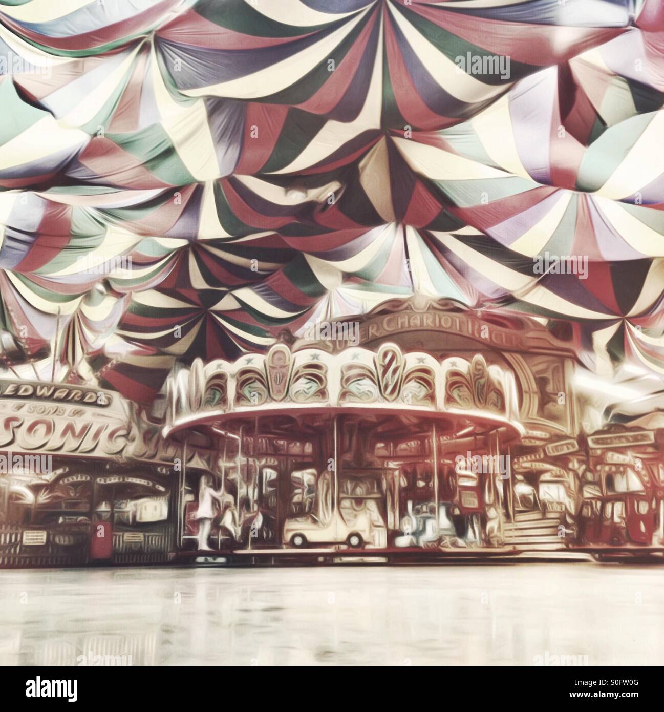 Fairground rides under a canopy - Smartphone Captured Stock Image
