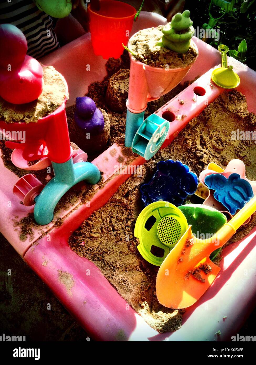 Sand pit and toys Stock Photo Alamy
