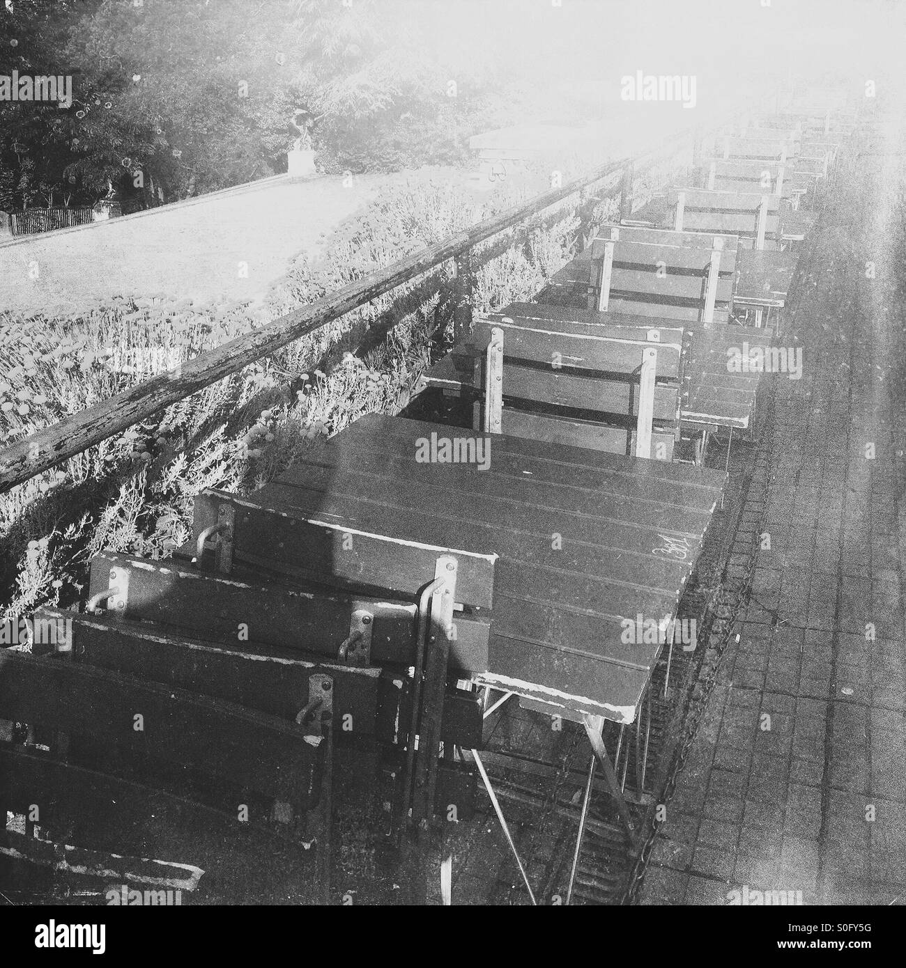 Table and chairs disappearing in the horizon - Smartphone Captured Stock Image