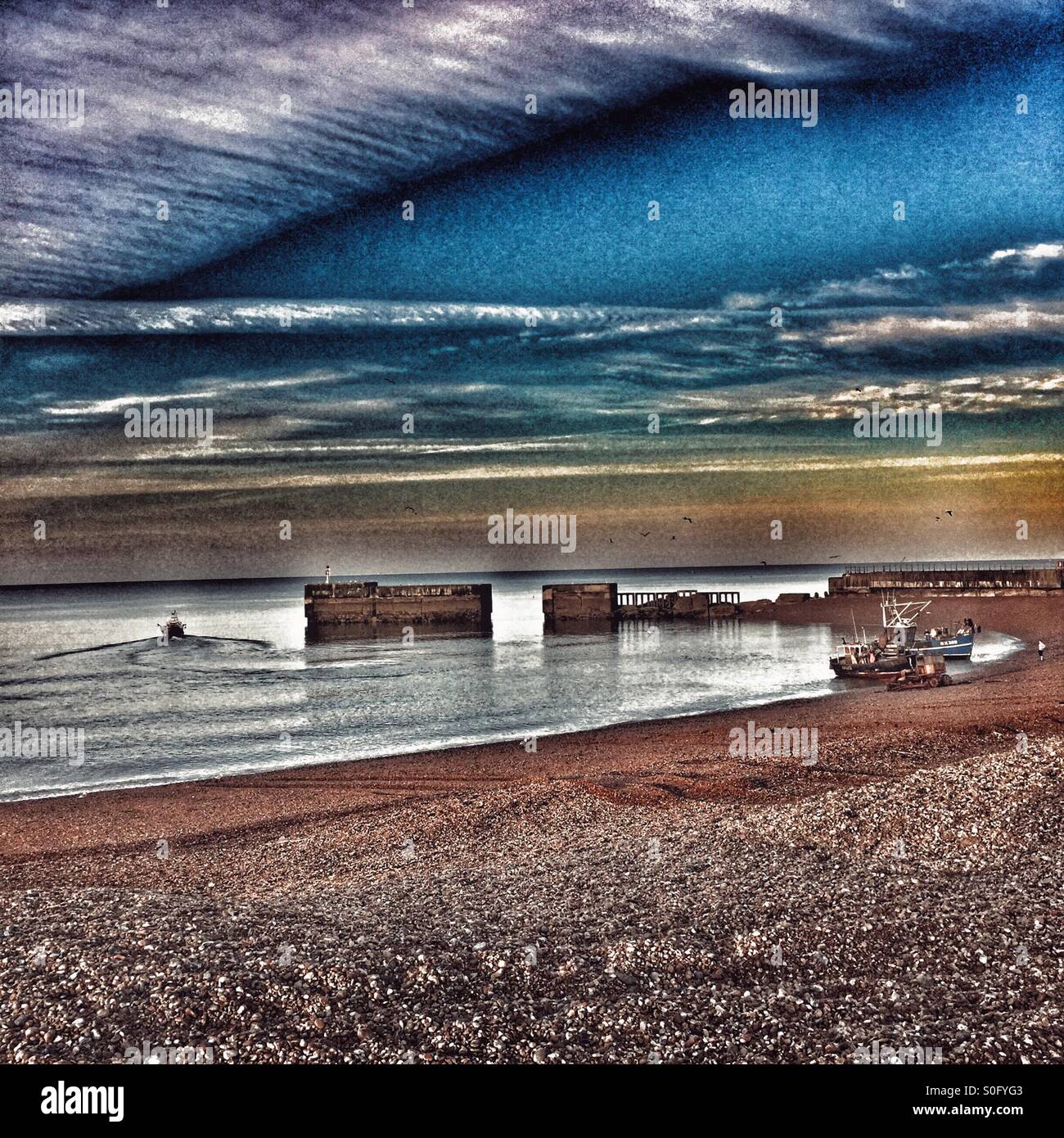 Hastings harbour at dawn on a Summer morning, East Sussex coast, England, UK - Smartphone Captured Stock Image