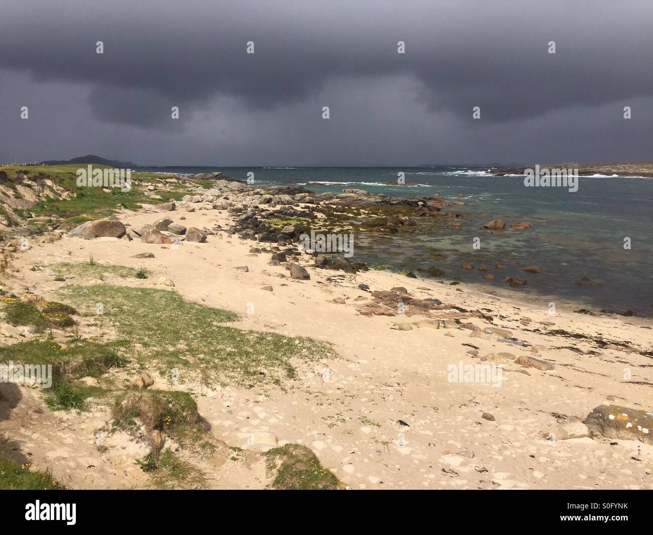 Omey Island one step before rain. Stock Photo