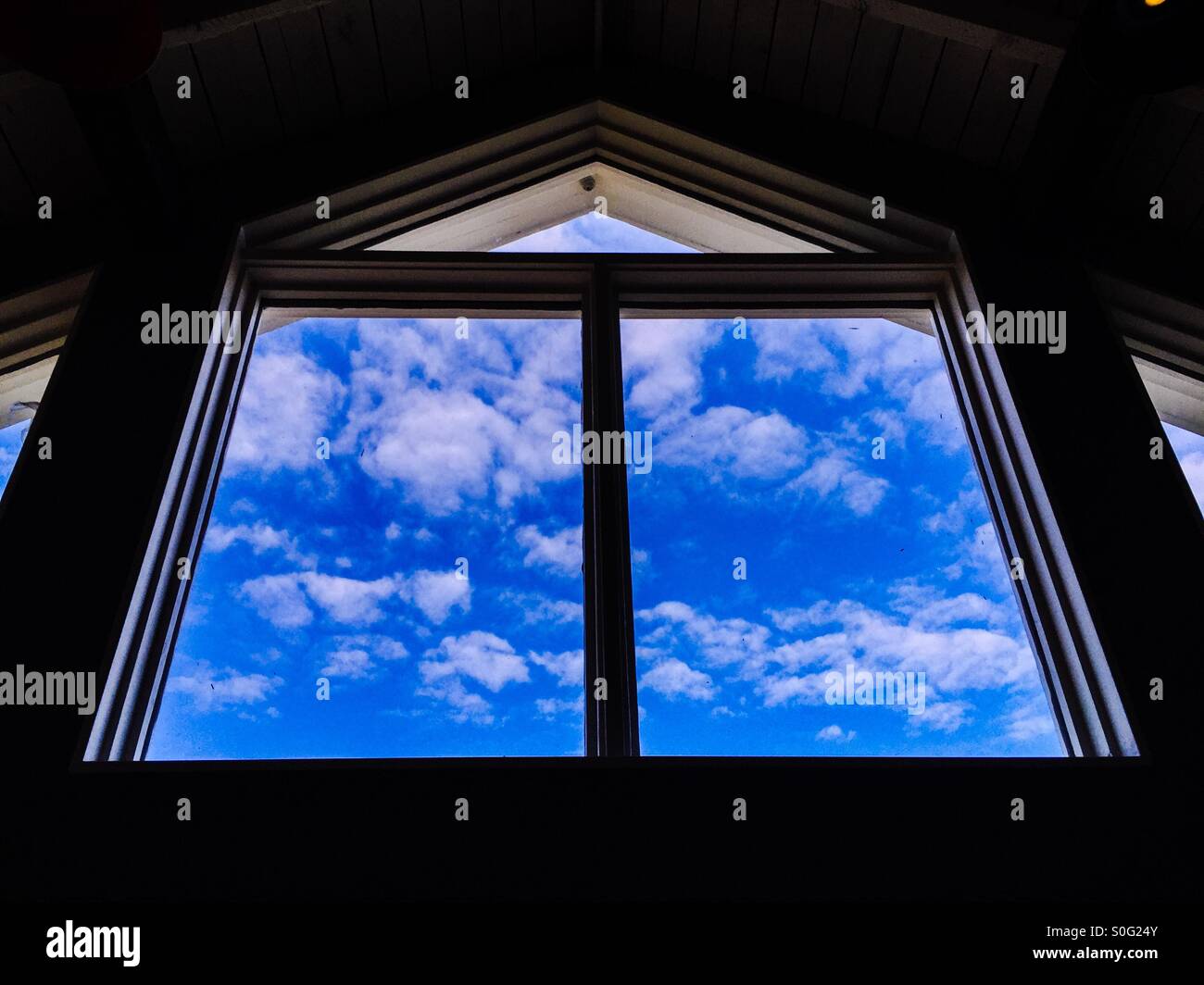 Geometry of clouds and windows - Smartphone Captured Stock Image