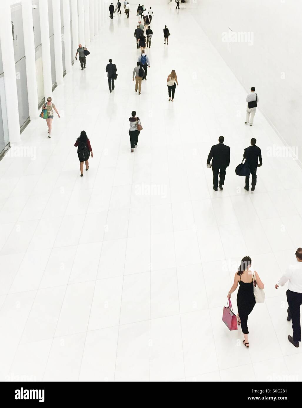 Business people in underground passageway at one world trade center in NYC - Smartphone Captured Stock Image