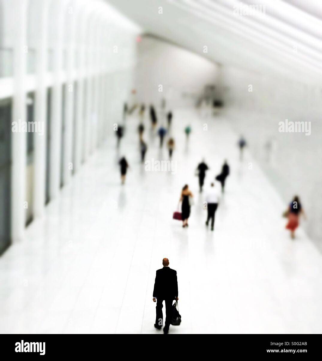 Commuters in underground passageway at one World Trade Center in New York City - Smartphone Captured Stock Image