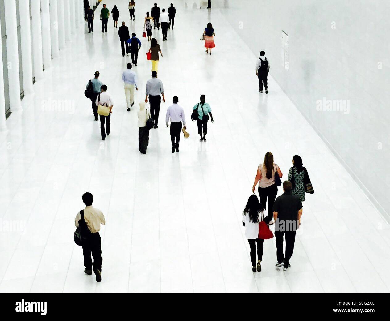 Commuters in underground passageway of one world trade center in NYC - Smartphone Captured Stock Image