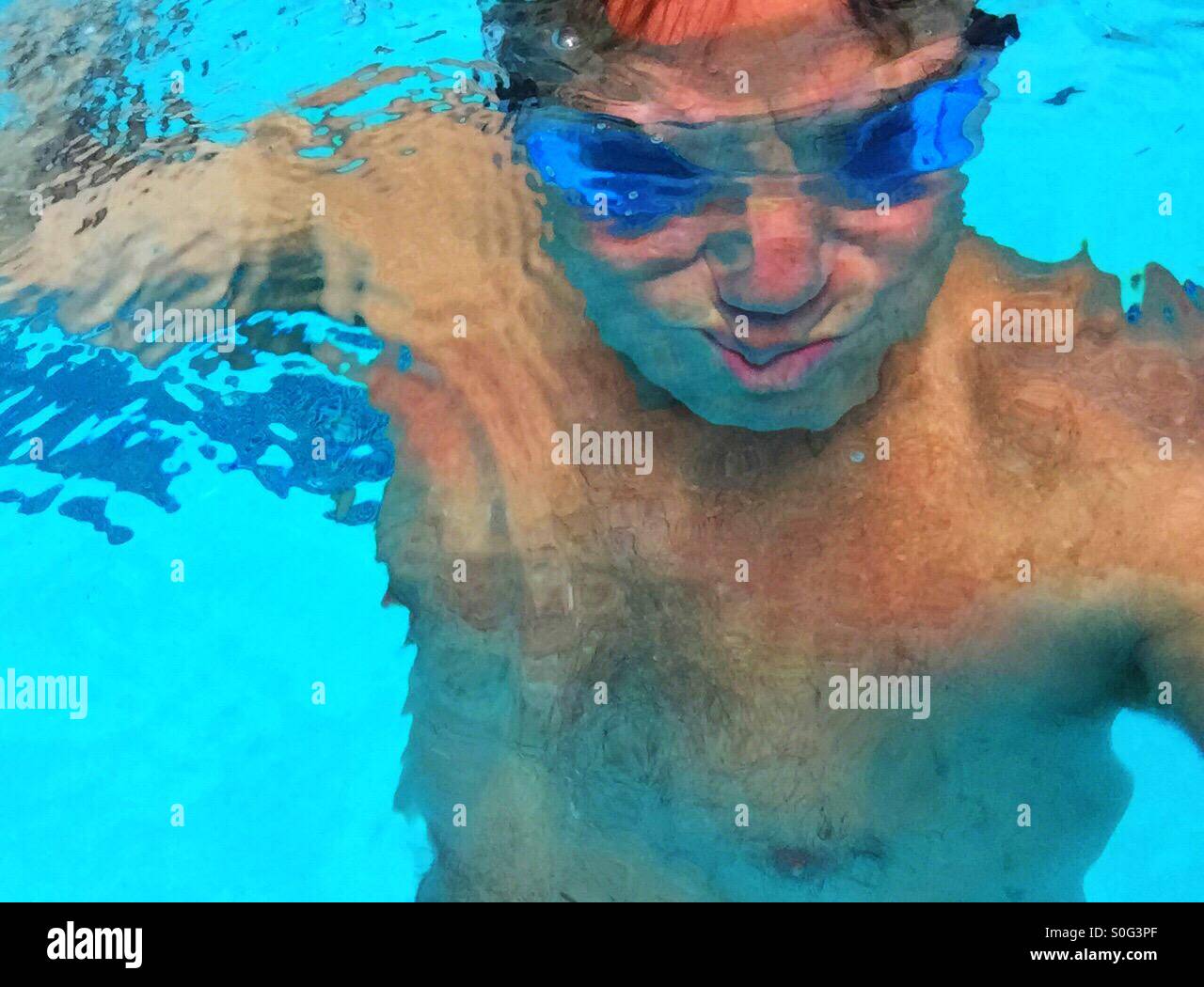 Swimmer underwater. - Smartphone Captured Stock Image