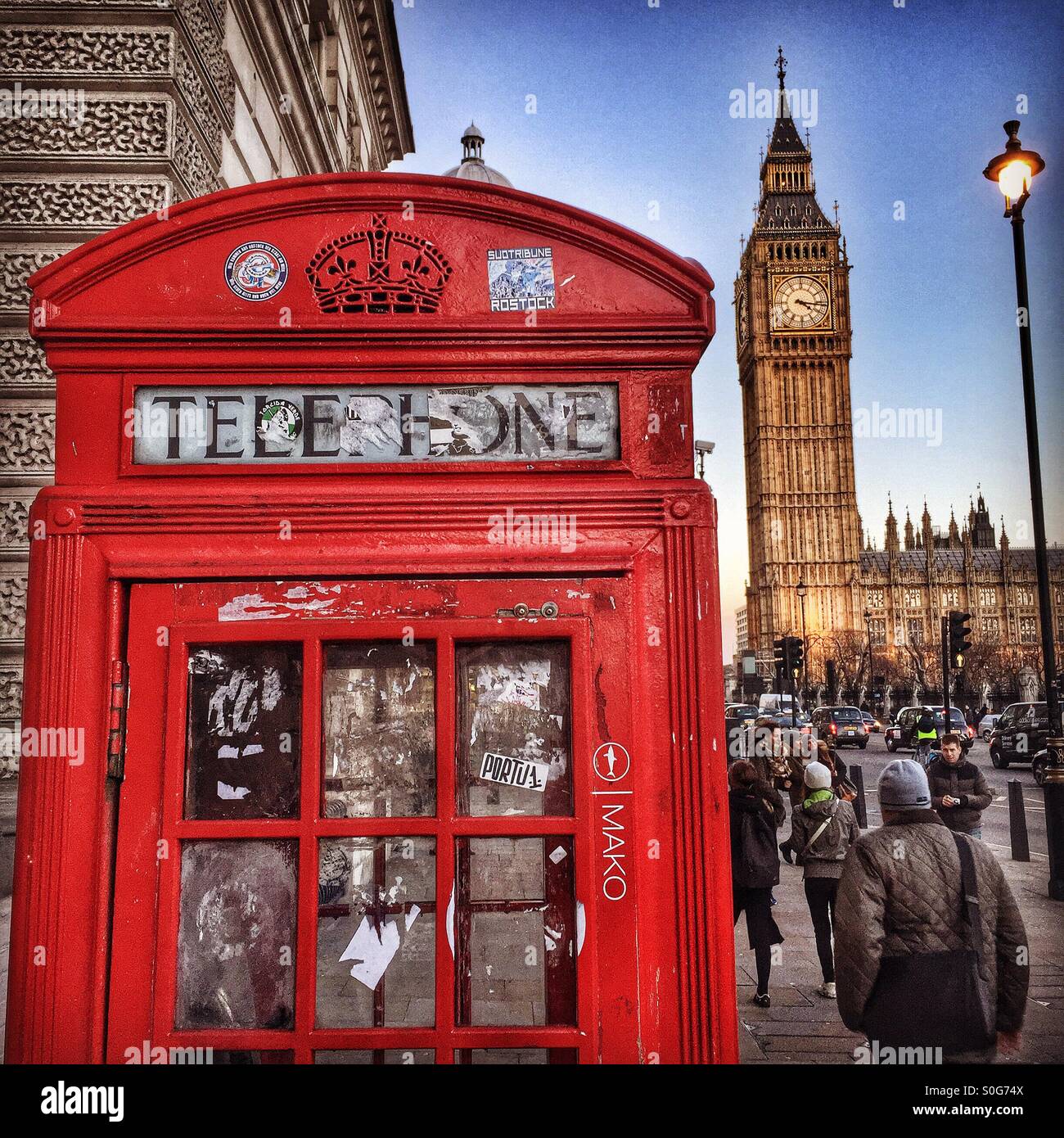 Red phone box in front of UK Houses of Parliament - Smartphone Captured Stock Image