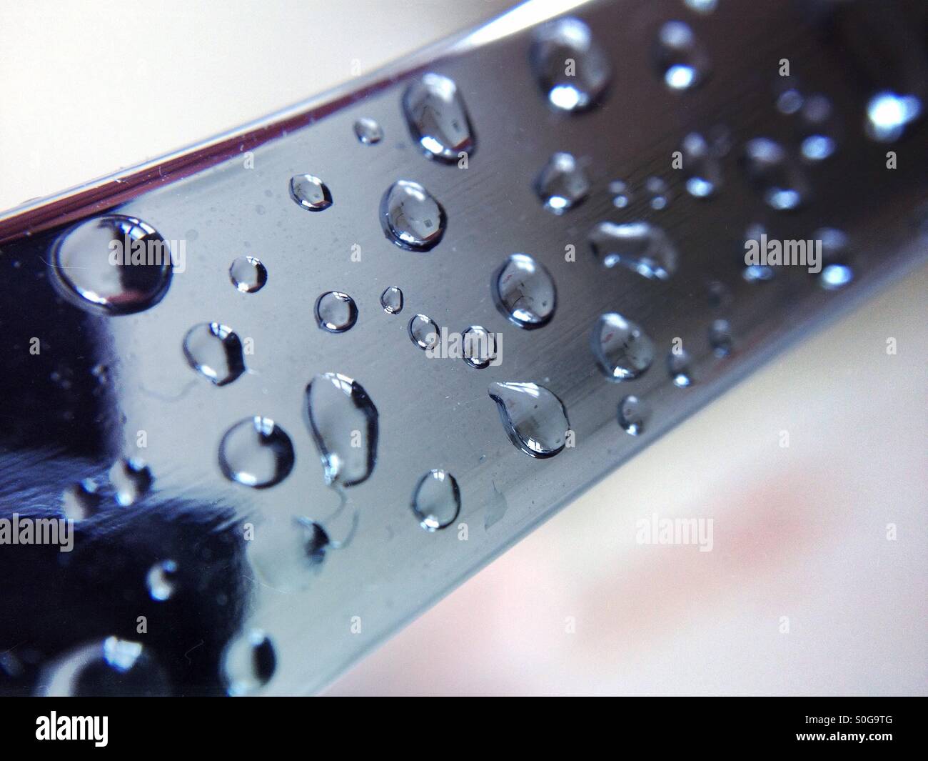 Water drops on a chrome towel rail - Smartphone Captured Stock Image
