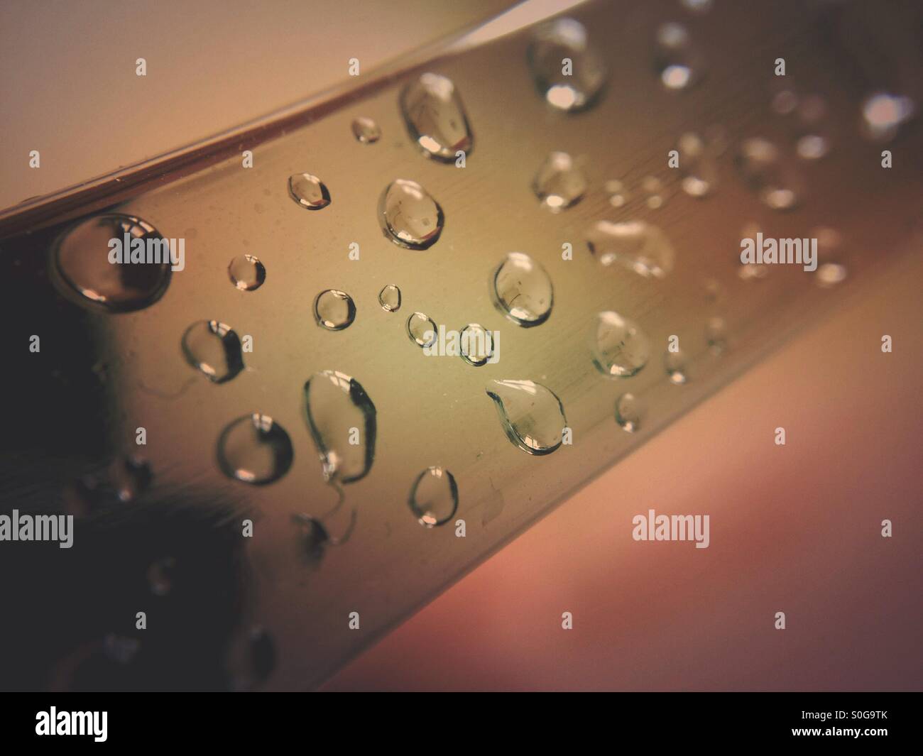 Water drops on a chrome towel rail - Smartphone Captured Stock Image