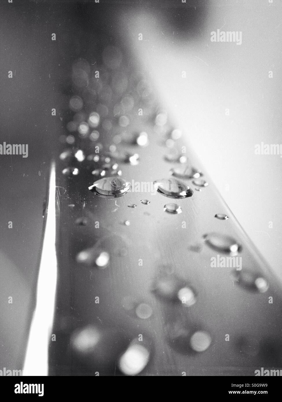 Water drops on a chrome towel rail - Smartphone Captured Stock Image