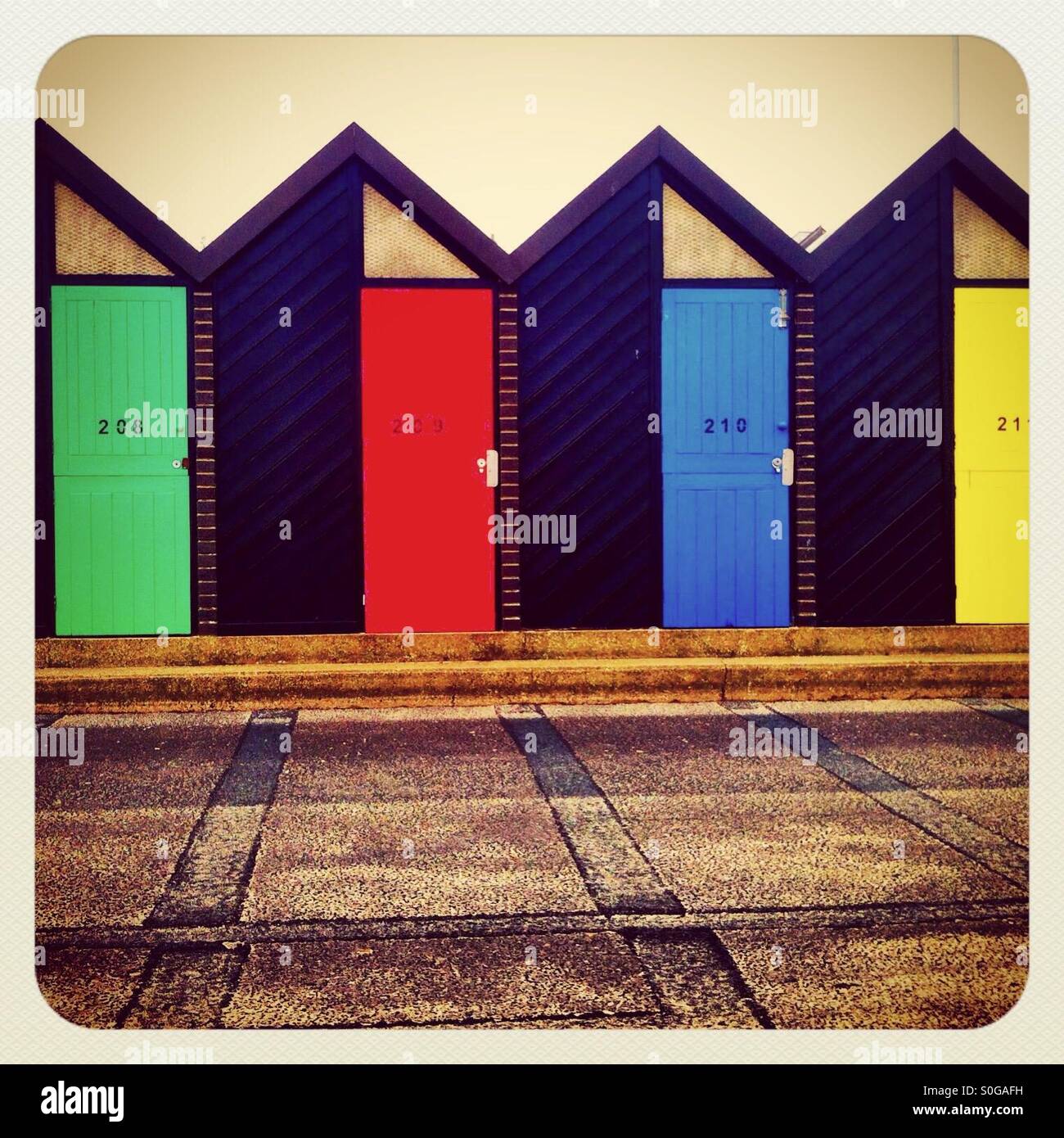 A row of brightly coloured beach huts, Lowestoft Stock Photo Alamy