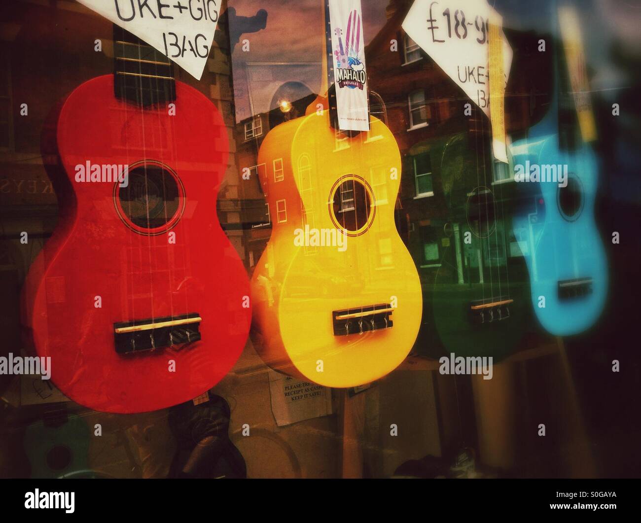 Ukuleles in shop window Stock Photo Alamy