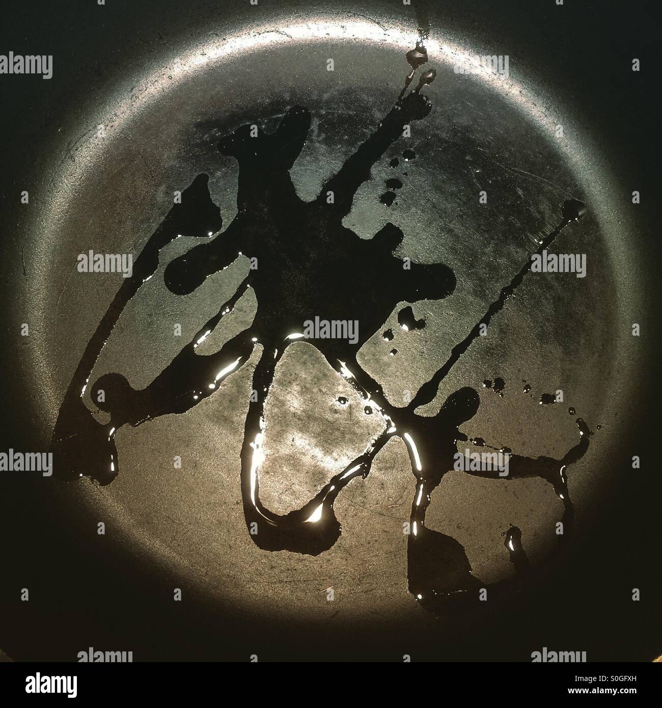 Oil in a frying pan, Japanese Sumi-e style - Smartphone Captured Stock Image
