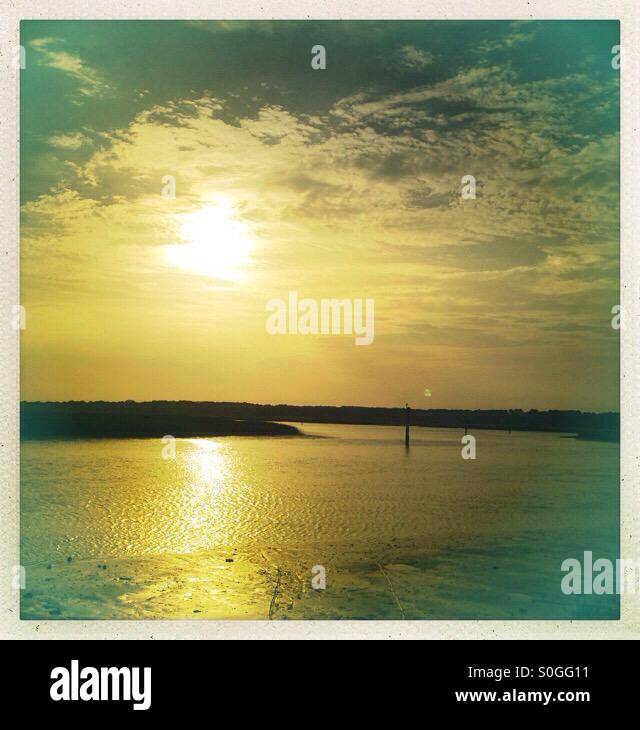 Sunset over Broad Creek salt marsh at Hilton Head Island Stock Photo