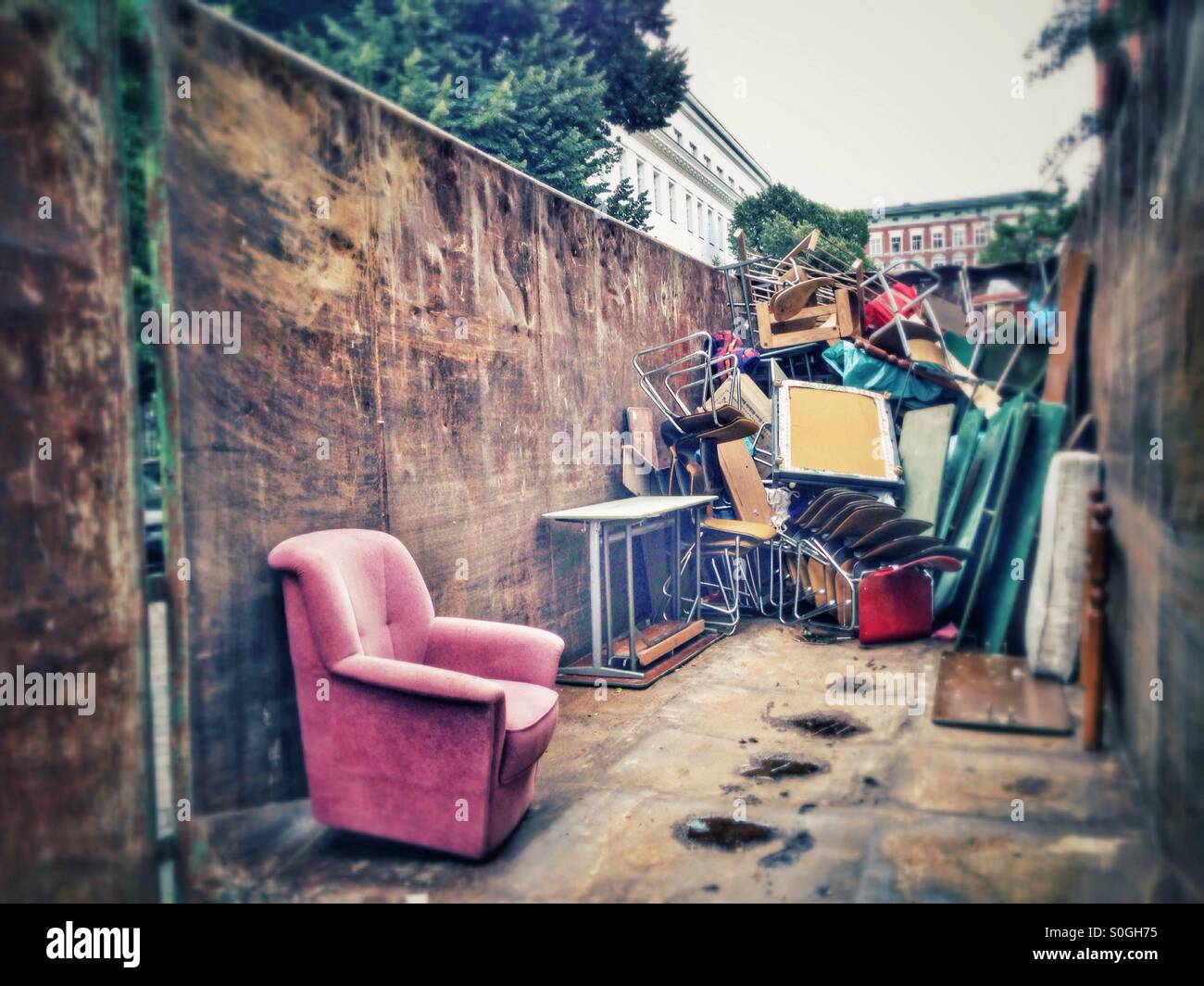 Junk in a Container Stock Photo Alamy