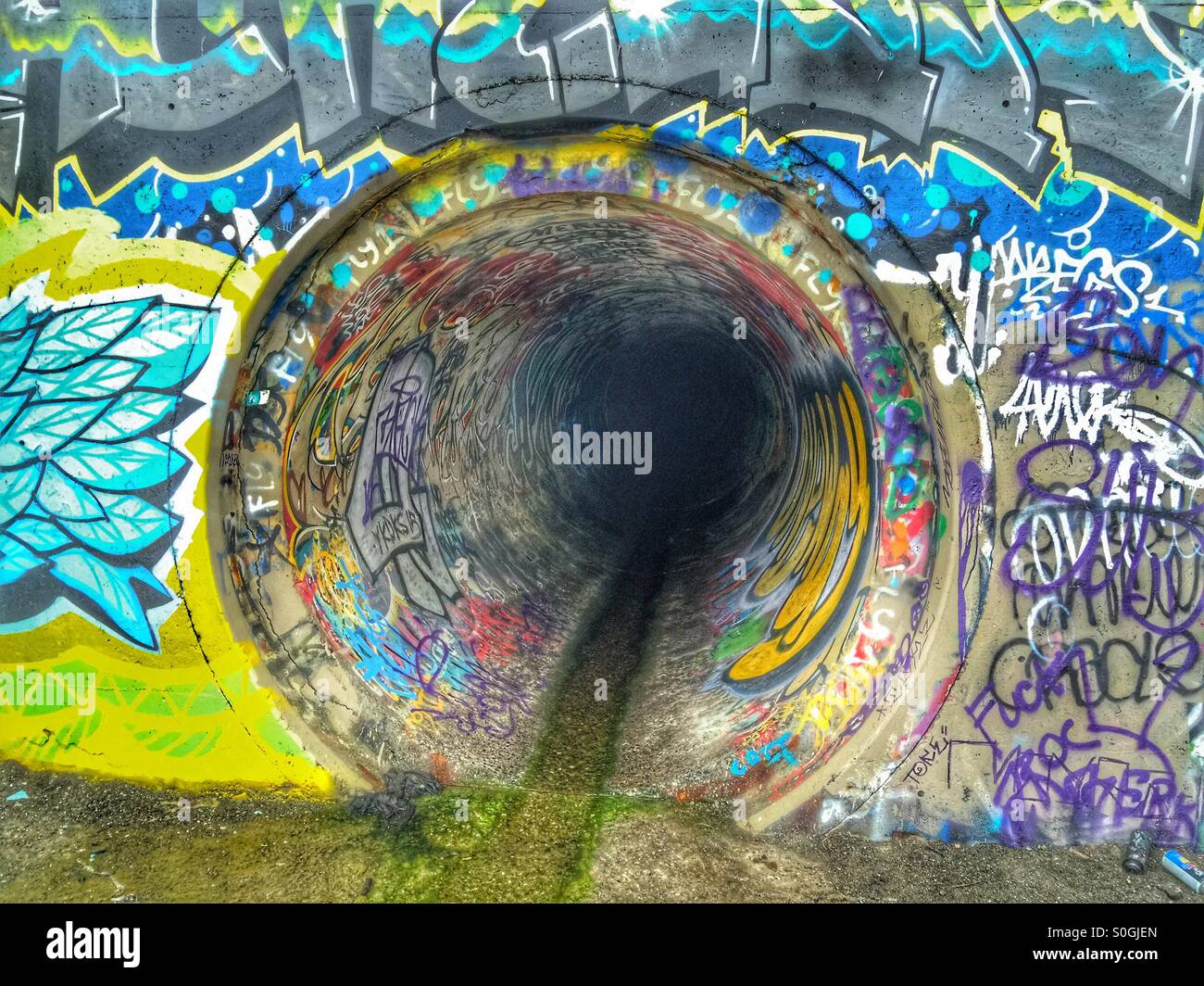 Rain Storm drainage pipe graffiti Stock Photo