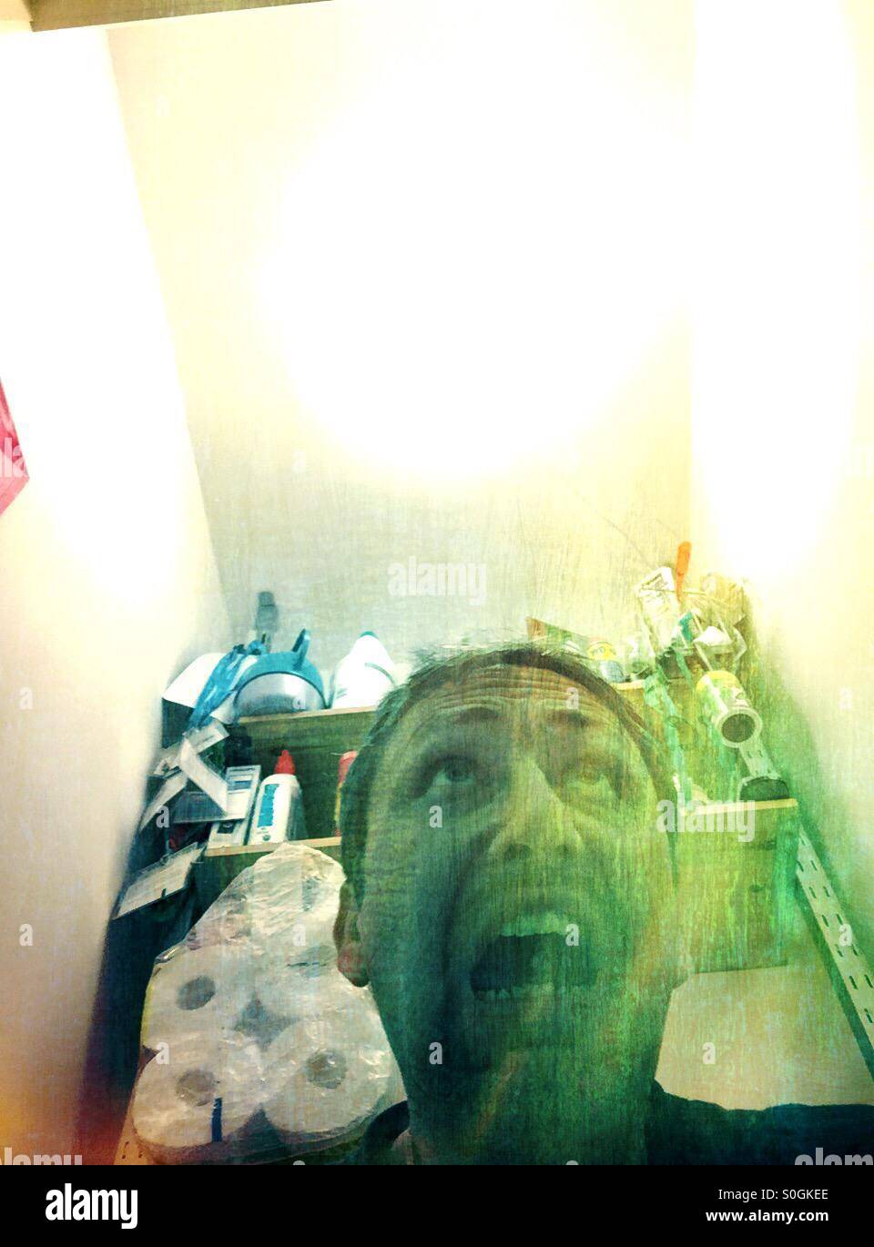 Panic in the broom closet - Smartphone Captured Stock Image