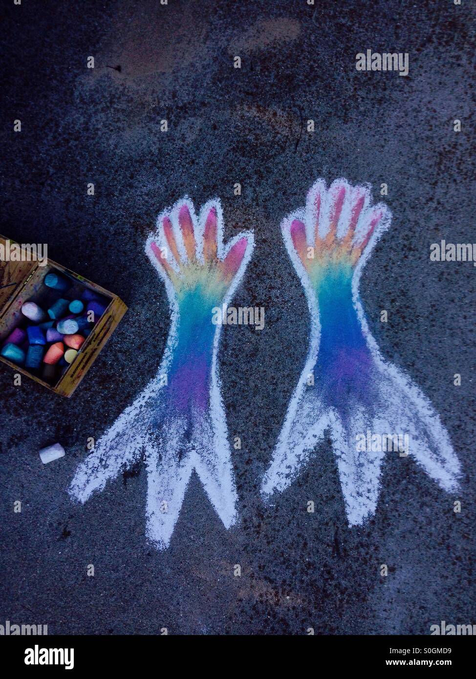 Chalk hands with a chalk box Stock Photo Alamy