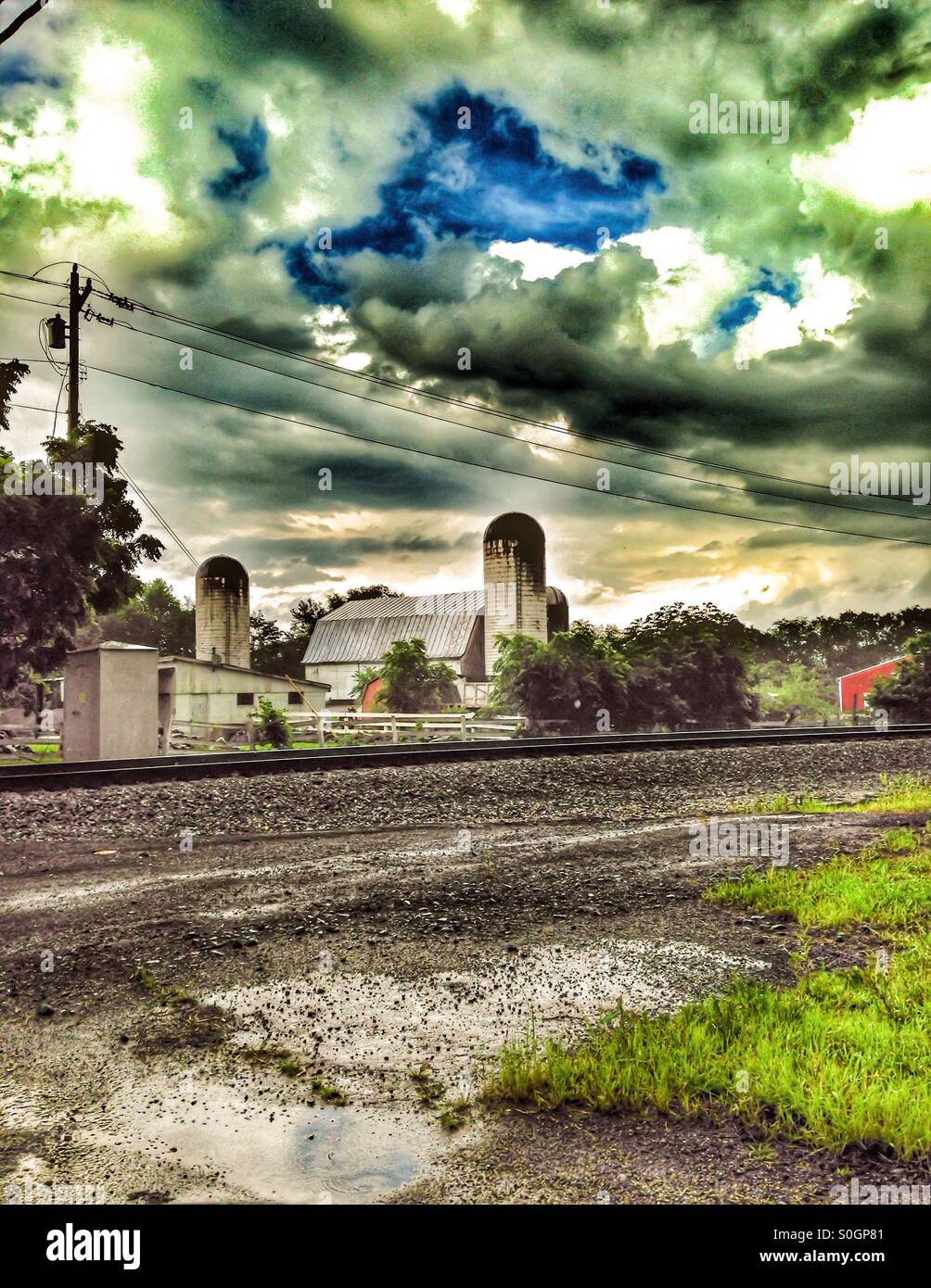 A farm by the railroad tracks (2). - Smartphone Captured Stock Image