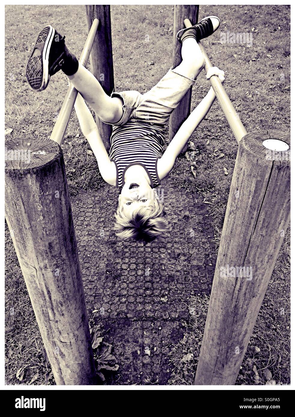 Boy in a playground Stock Photo