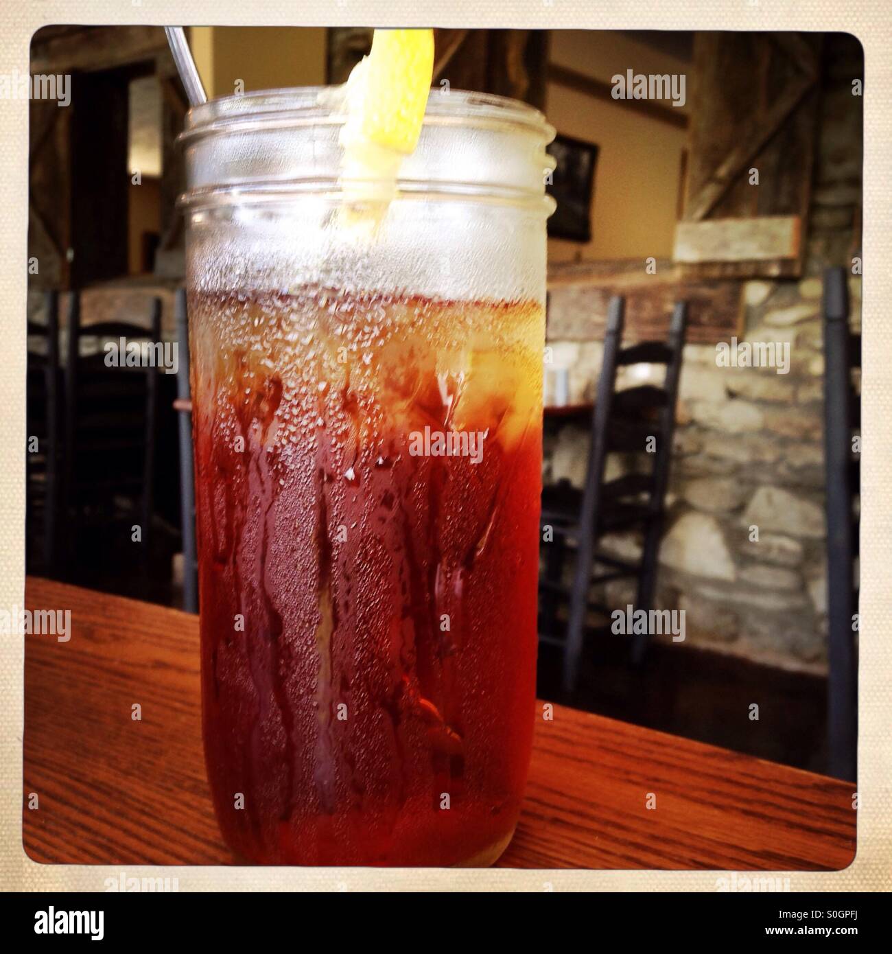 Cold iced tea in a jar. - Smartphone Captured Stock Image
