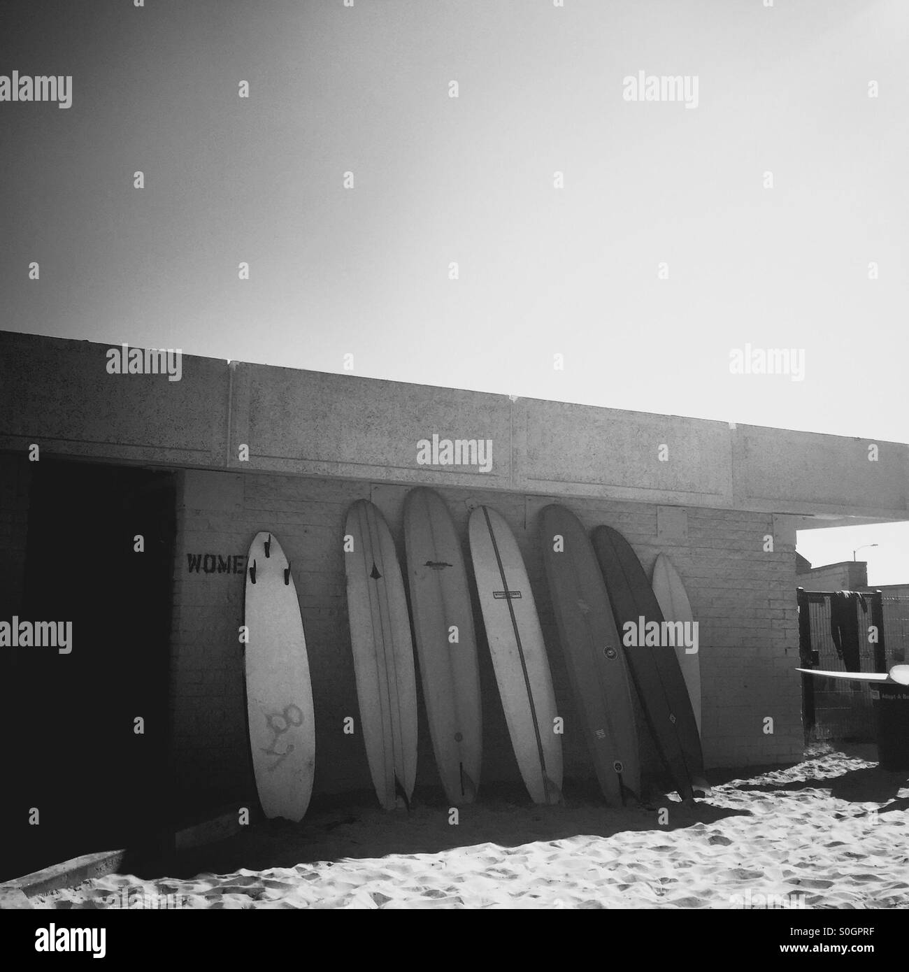 Surfboards on wall at surfrider beach. Malibu, California USA Stock
