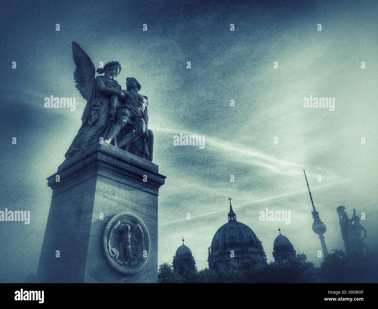 Angel statue and Berlin skyline Stock Photo