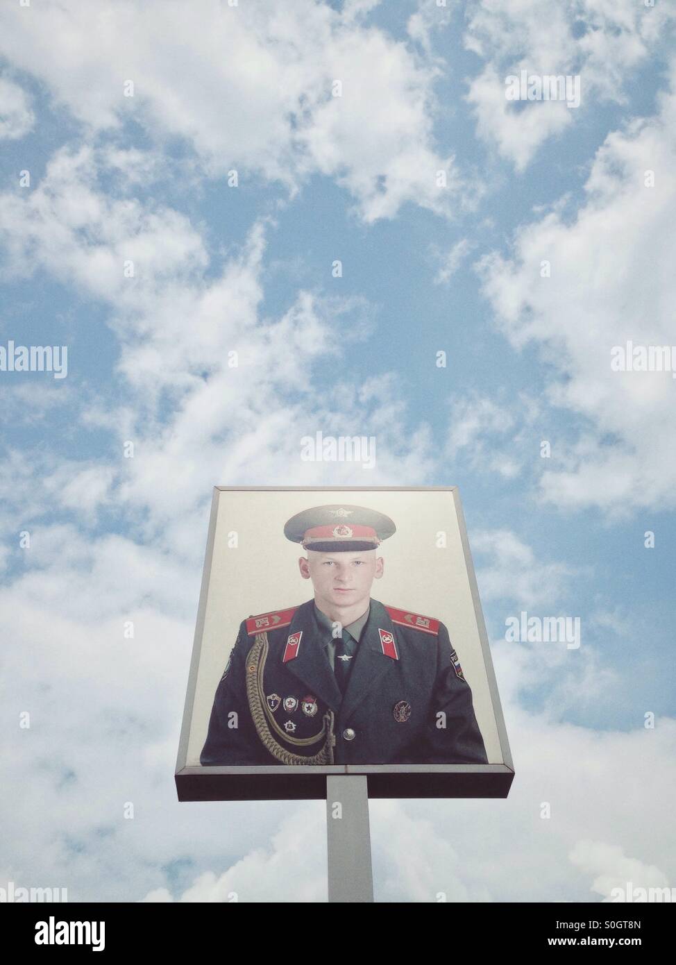 Photo of a soviet soldier as part of an Art Installation at Checkpoint Charlie in Berlin Germany - Smartphone Captured Stock Image