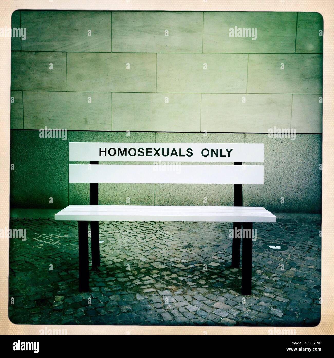 A Bench in front of the German historical Museum in Berlin Mitte Germany Claims Homosexuals only. It is Part of an exhibition about the history of homosexualities in the Second half of the year 2015 - Smartphone Captured Stock Image