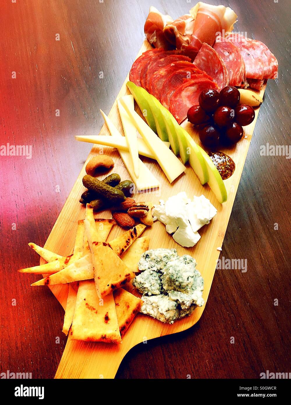 Charcuterie platter of meat and cheese and fruit - Smartphone Captured Stock Image