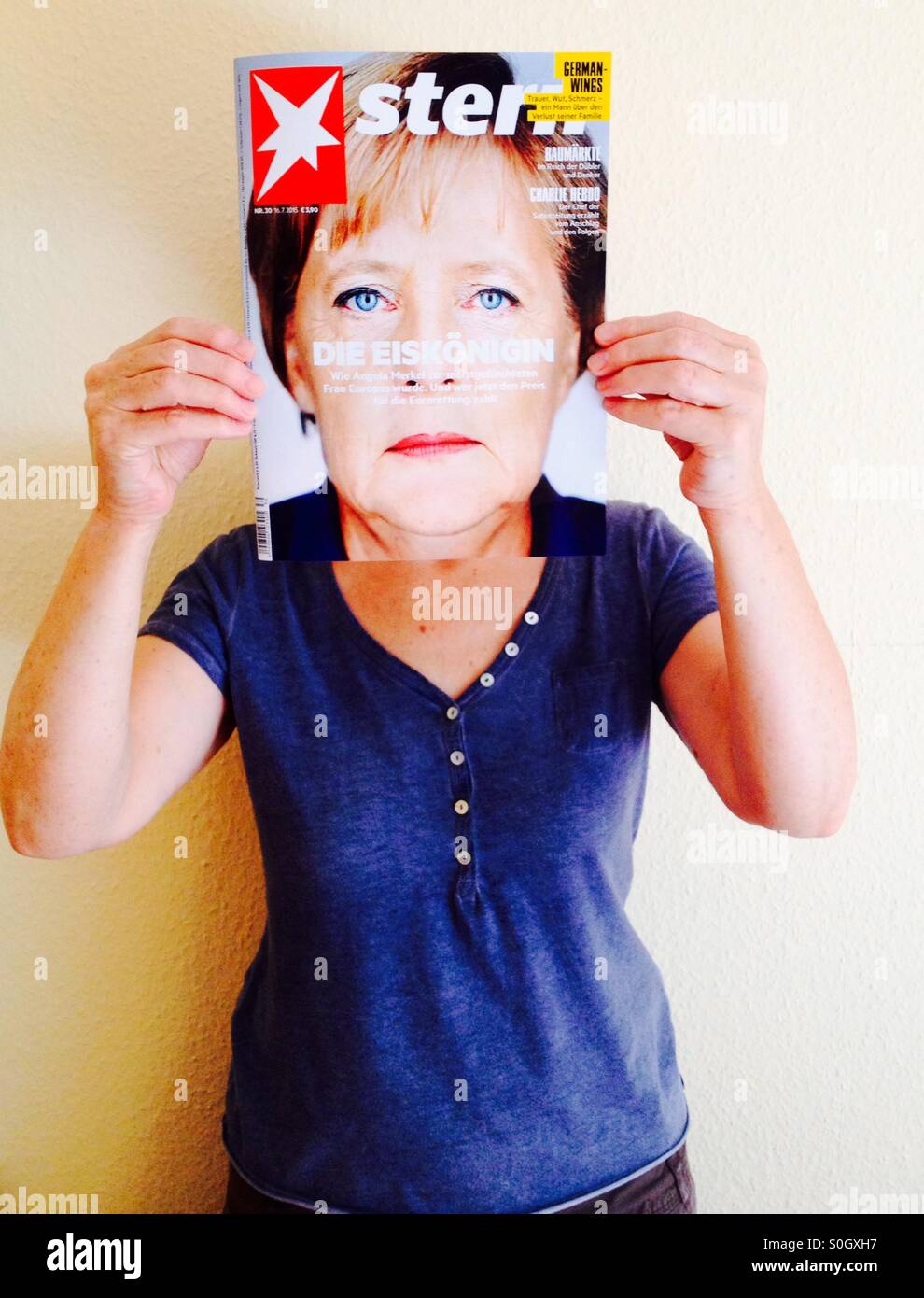 Stern magazine with the German chancellor Angela Merkel on the cover - Smartphone Captured Stock Image