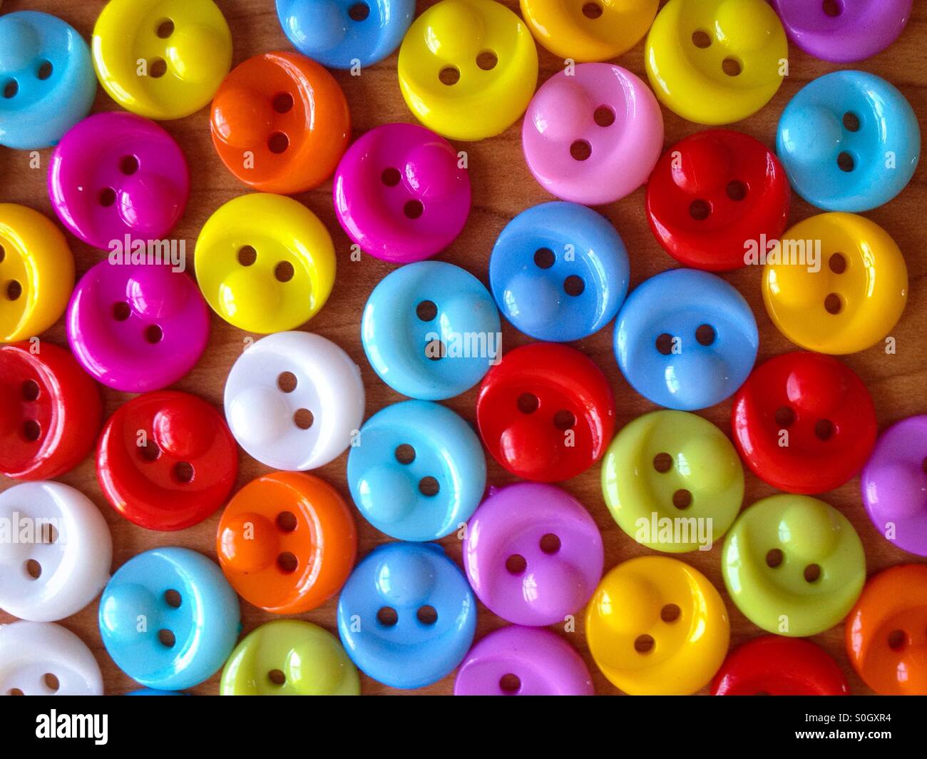 Sewing button rainbow hi-res stock photography and images - Alamy
