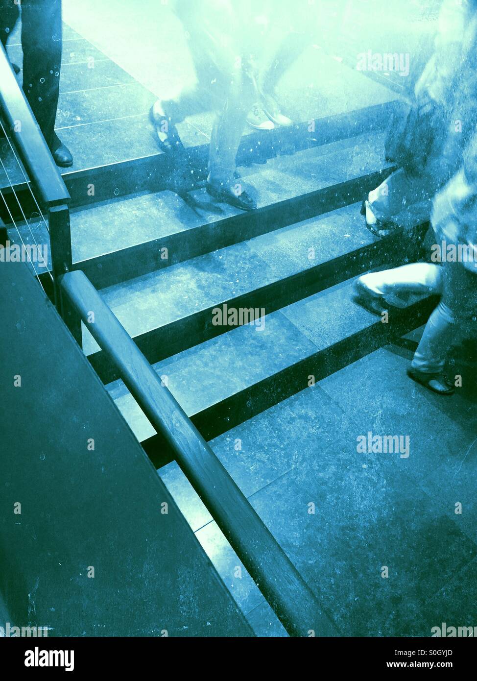 Walking down metal stairs - Smartphone Captured Stock Image