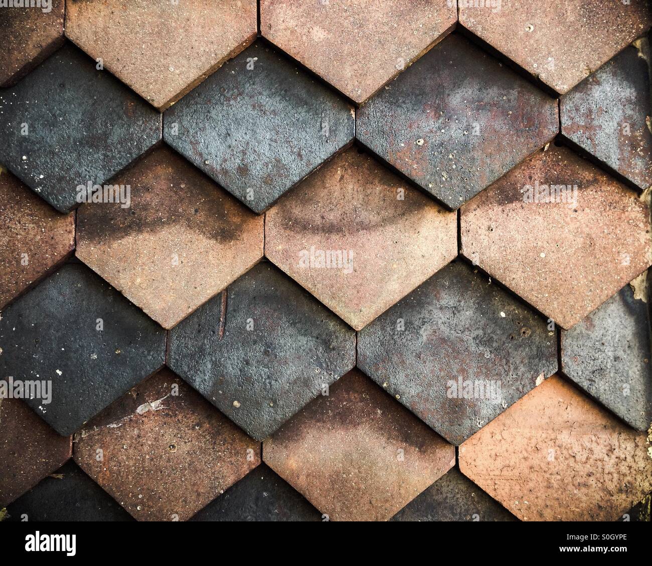 Overlapping tiles on wall of country house Stock Photo Alamy