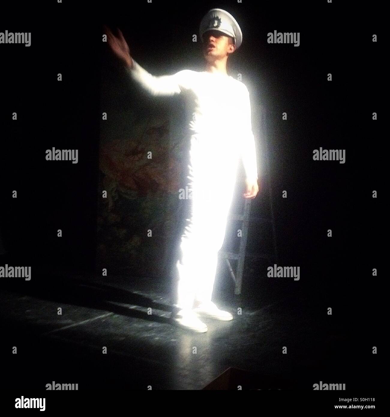 An actor performs Vida y Obra de Dalomismo in Foro Contigo America theater in Colonia Napoles, Mexico City, Mexico - Smartphone Captured Stock Image An actor performs Vida y Obra de Dalomismo in Foro Contigo America theater in Colonia Napoles, Mexico City, Mexico - Smartphone Captured Stock Image