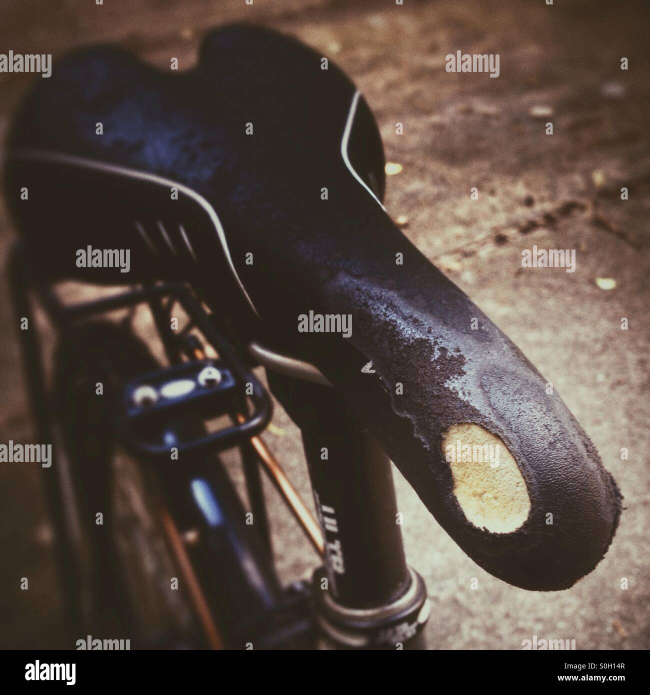 Abrasions on a bicycle saddle due to friction while riding Stock Photo