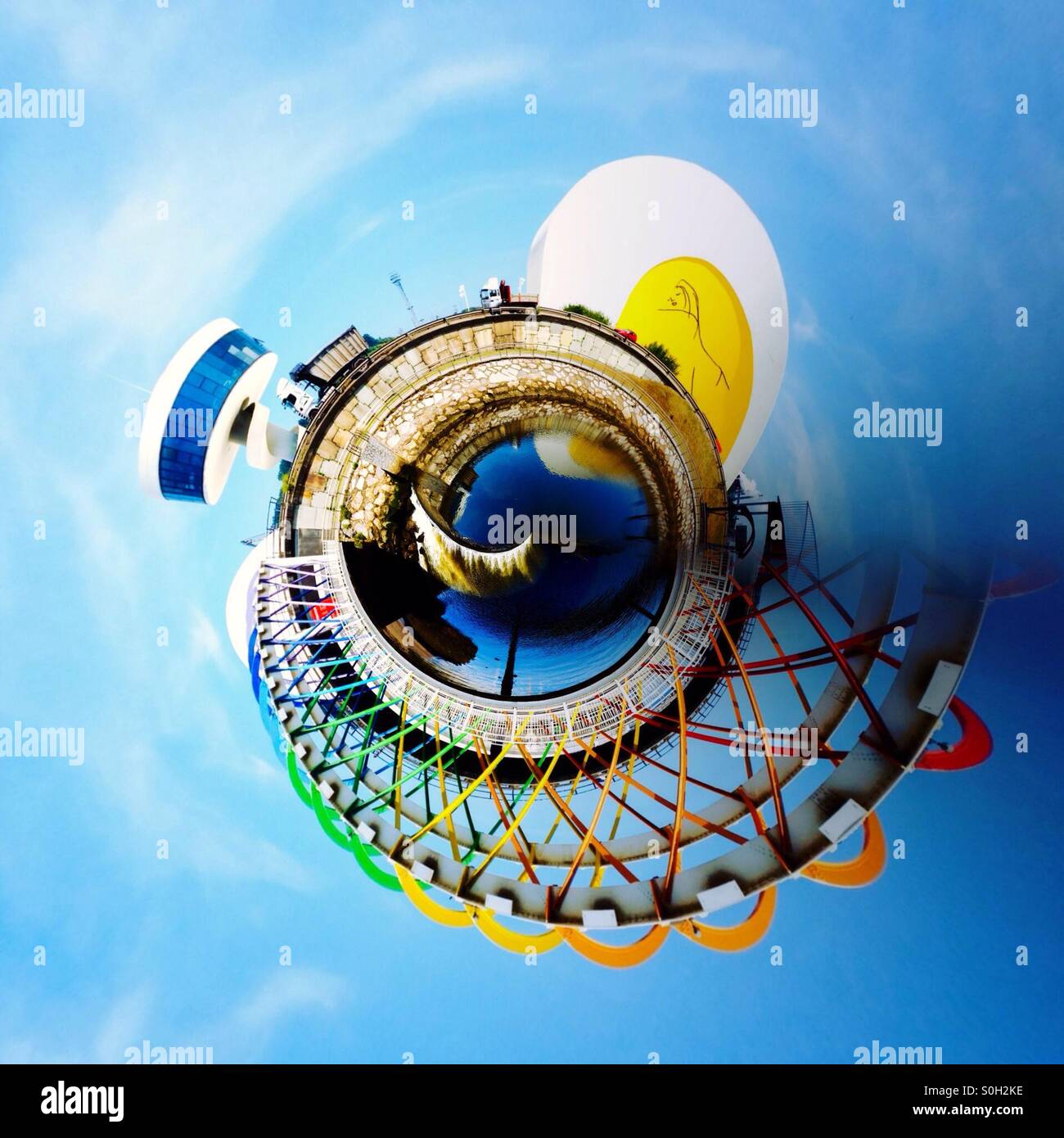 Tiny planet view of colorful bridge and Niemeyer Center in Aviles, Asturias - Spain - Smartphone Captured Stock Image