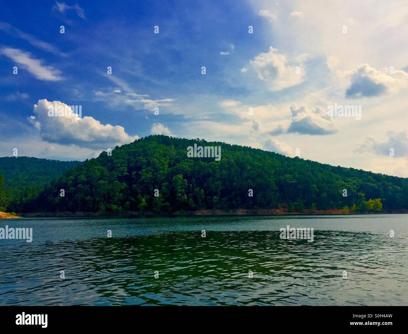 Mountains and the waterline. Stock Photo