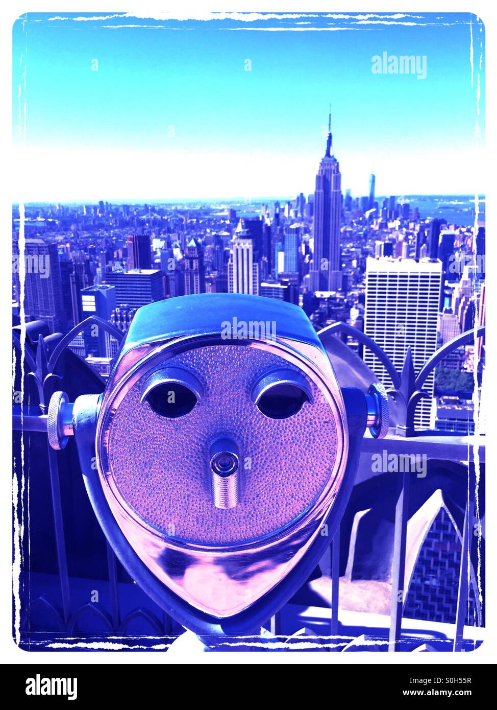 Coin operated pay for view binoculars on observation deck at top of the rock NYC - Smartphone Captured Stock Image
