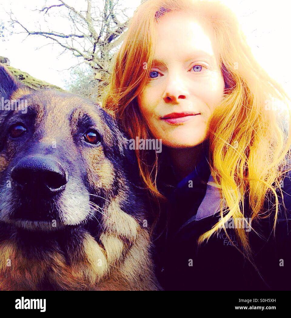 Sam and her alsatian in Wales. Stock Photo